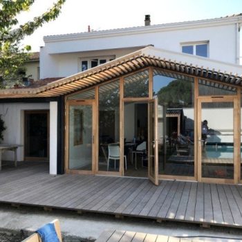 Après : une baie vitrée XXL pour ouvrir la maison sur le jardin